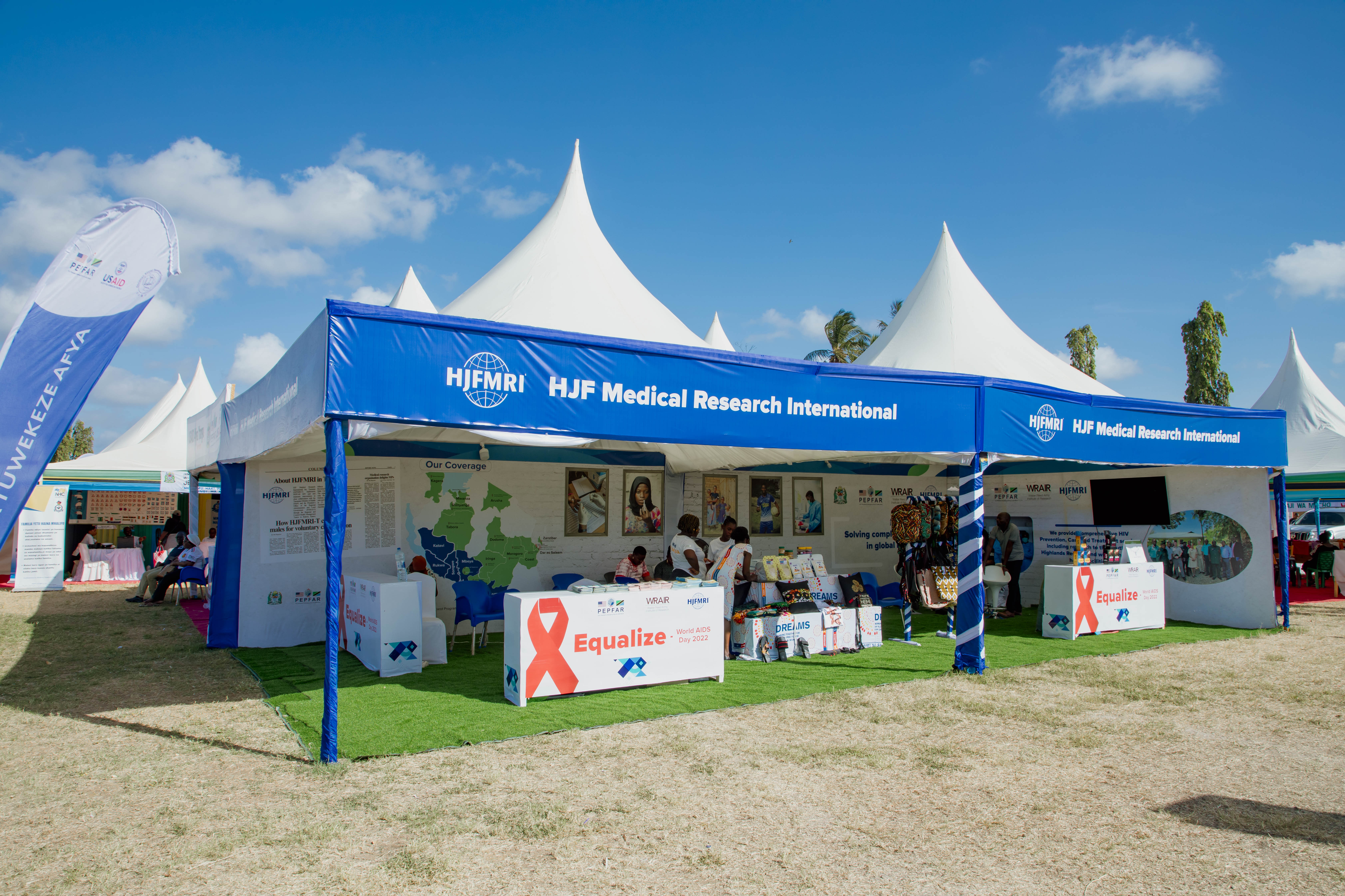 Tents with HJFMRI name at outdoor health fair